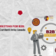 An illustration of two business professionals holding a laptop and surrounded by lead generation icons like targets, lightbulbs, and gears, representing content marketing for B2B.